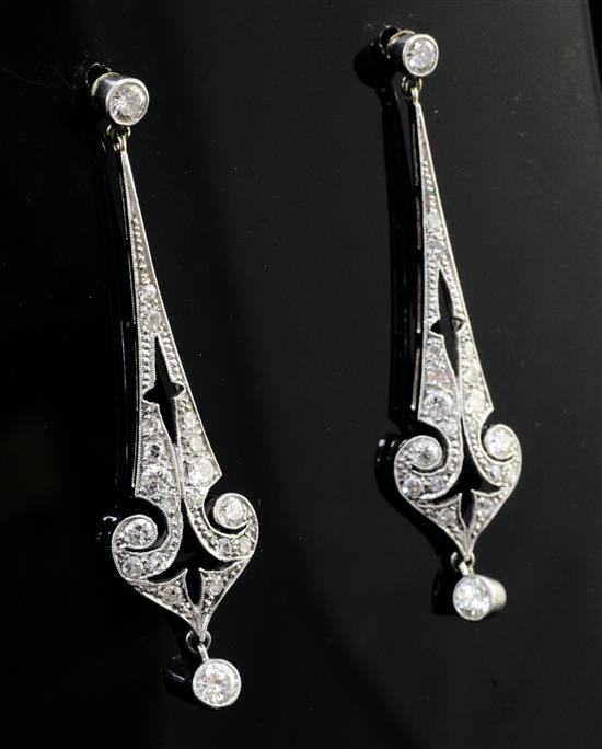 A pair of Belle Epoque unmarked white gold and diamond drop earrings, 1.75in.